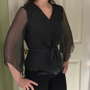 Black and white silk wrap top
